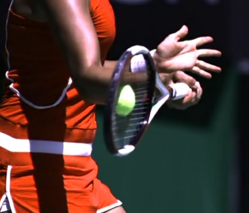 The moment of contact Tennis ball and strings deform