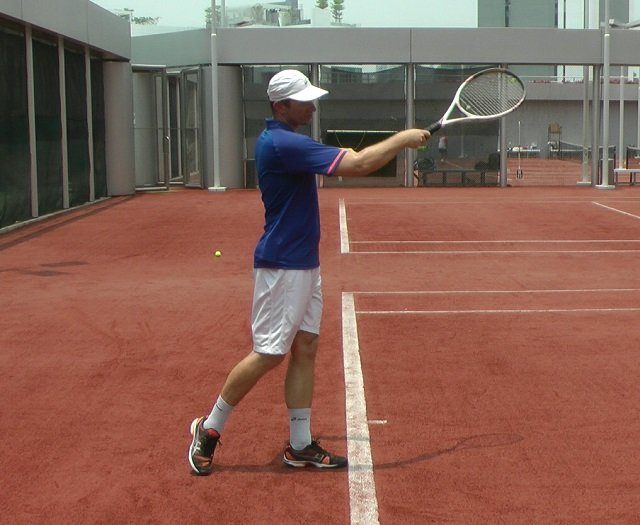 forehand-throw throwing tennis stroke
