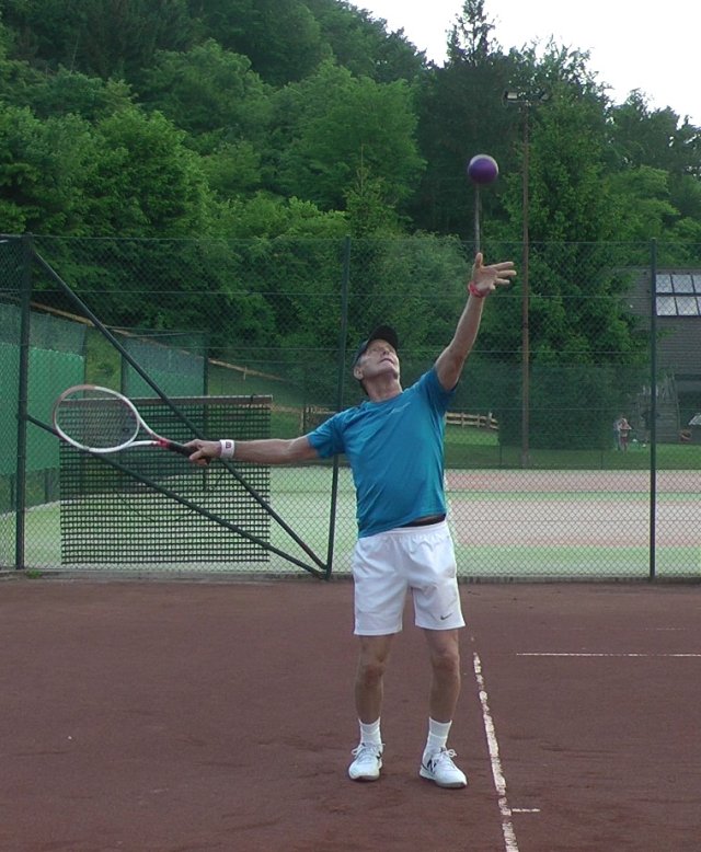 toss-heavy-ball serve toss of a heavier ball