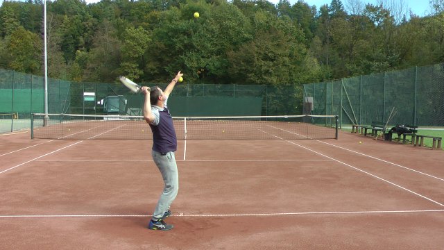 serve-forehand-grip tennis serve with a forehand grip