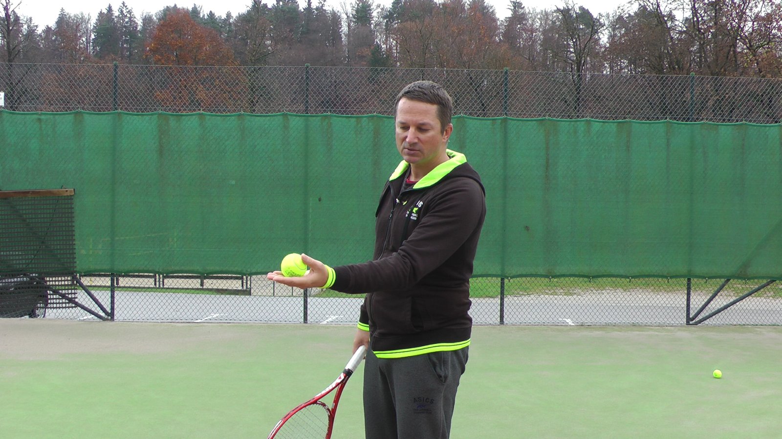 tennis serve toss holding ball
