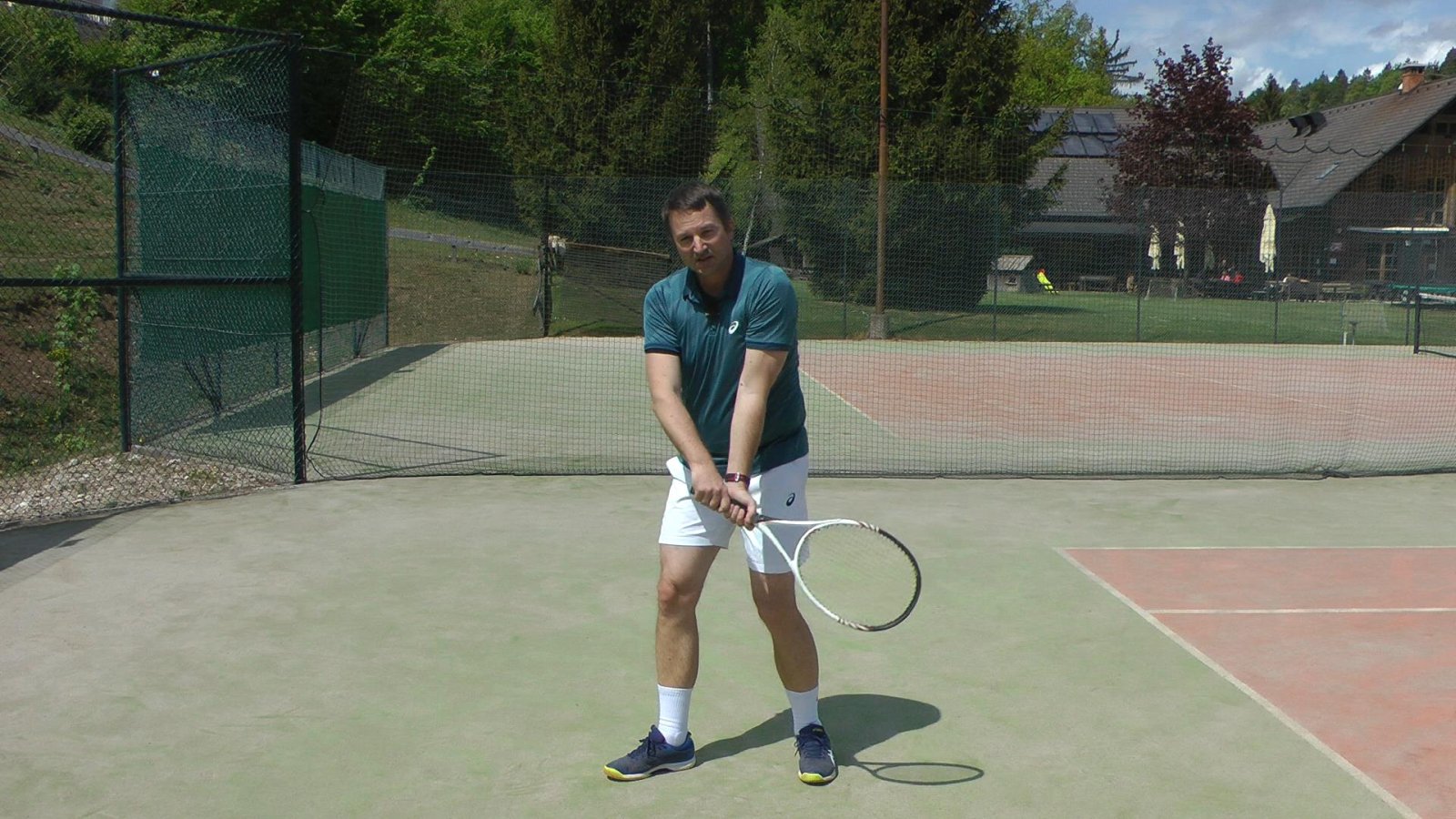 practicing tennis at home